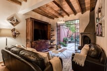 Living Room with Flat Screen TV & Outdoor Garden Patio